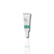 Small white tube of Brightening Eye Serum with green and black text and pointed applicator tip on white background.