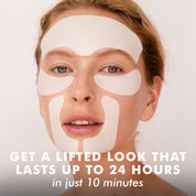 Woman with white facial lifting patches on forehead, cheeks, and chin against pale background.