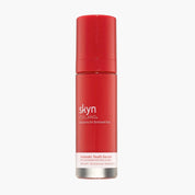 Red cylindrical bottle of Skyn Icelandic Youth Serum with white text and silver base.
