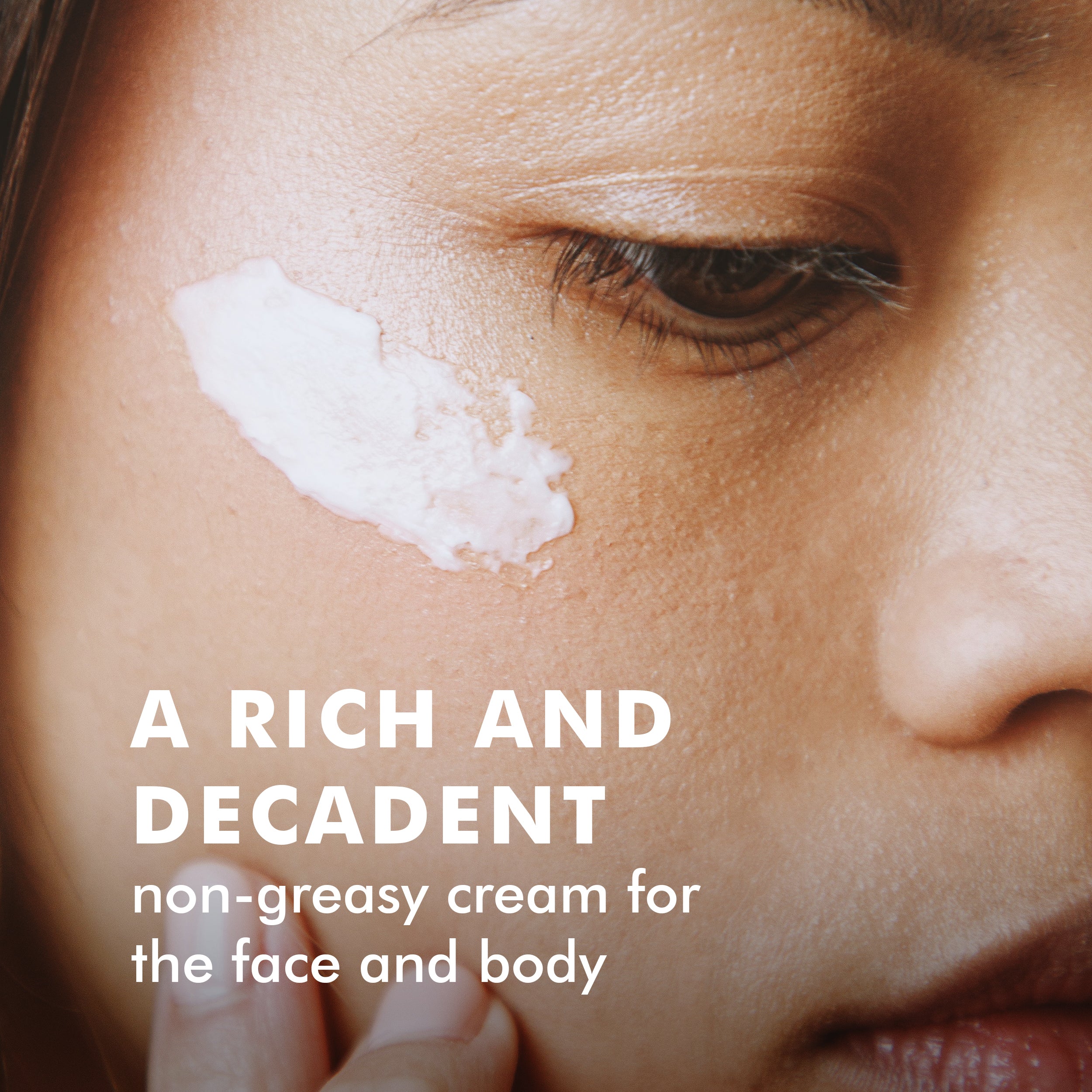 Close-up of a person’s cheek with white Arctic Repair Cream applied in a smooth streak.