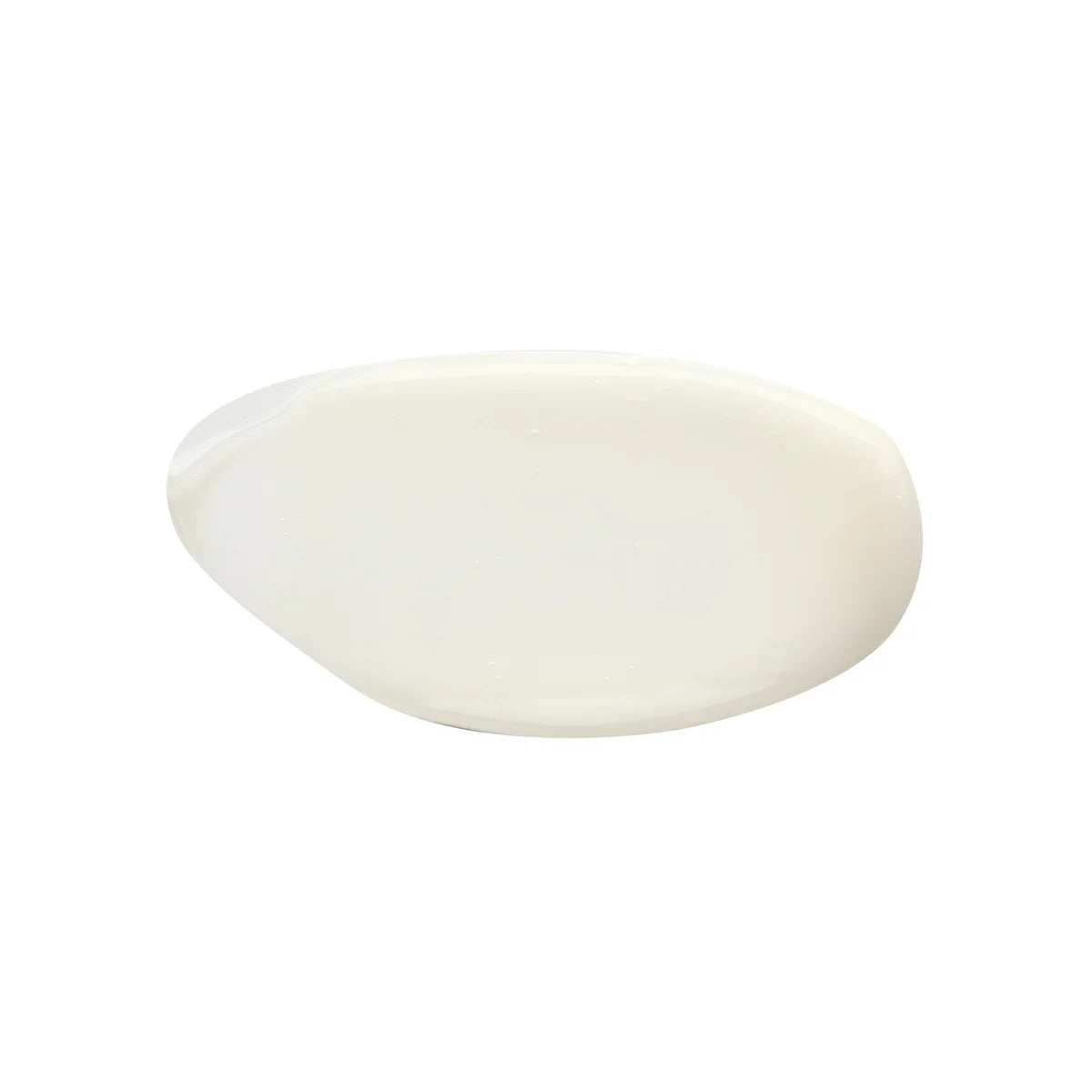 Smooth, white lotion swatch with a creamy texture on a white background.
