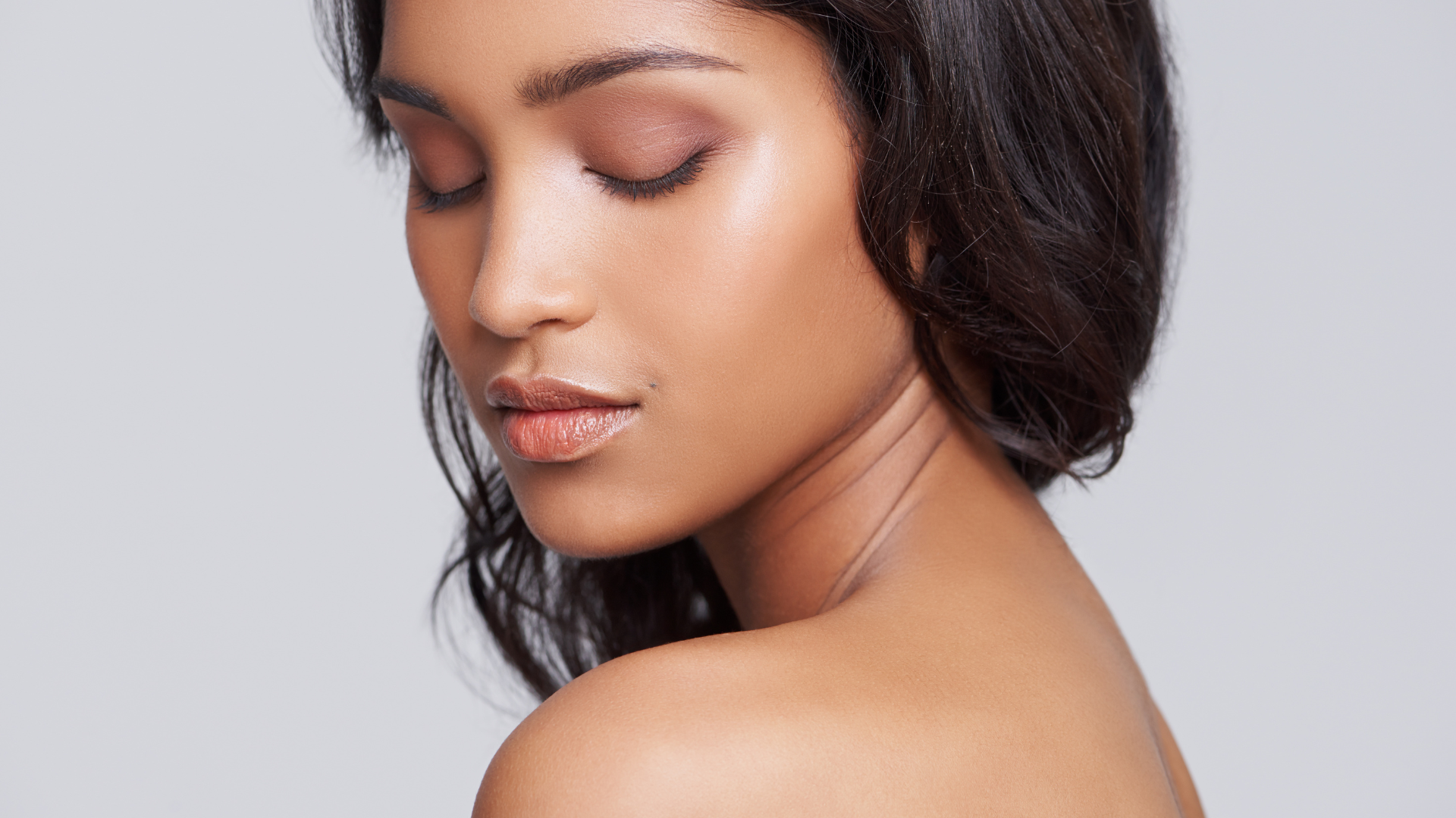 The Summer Skin Trap: How UV Rays, Heat, and SPF Buildup Affect Your Complexion