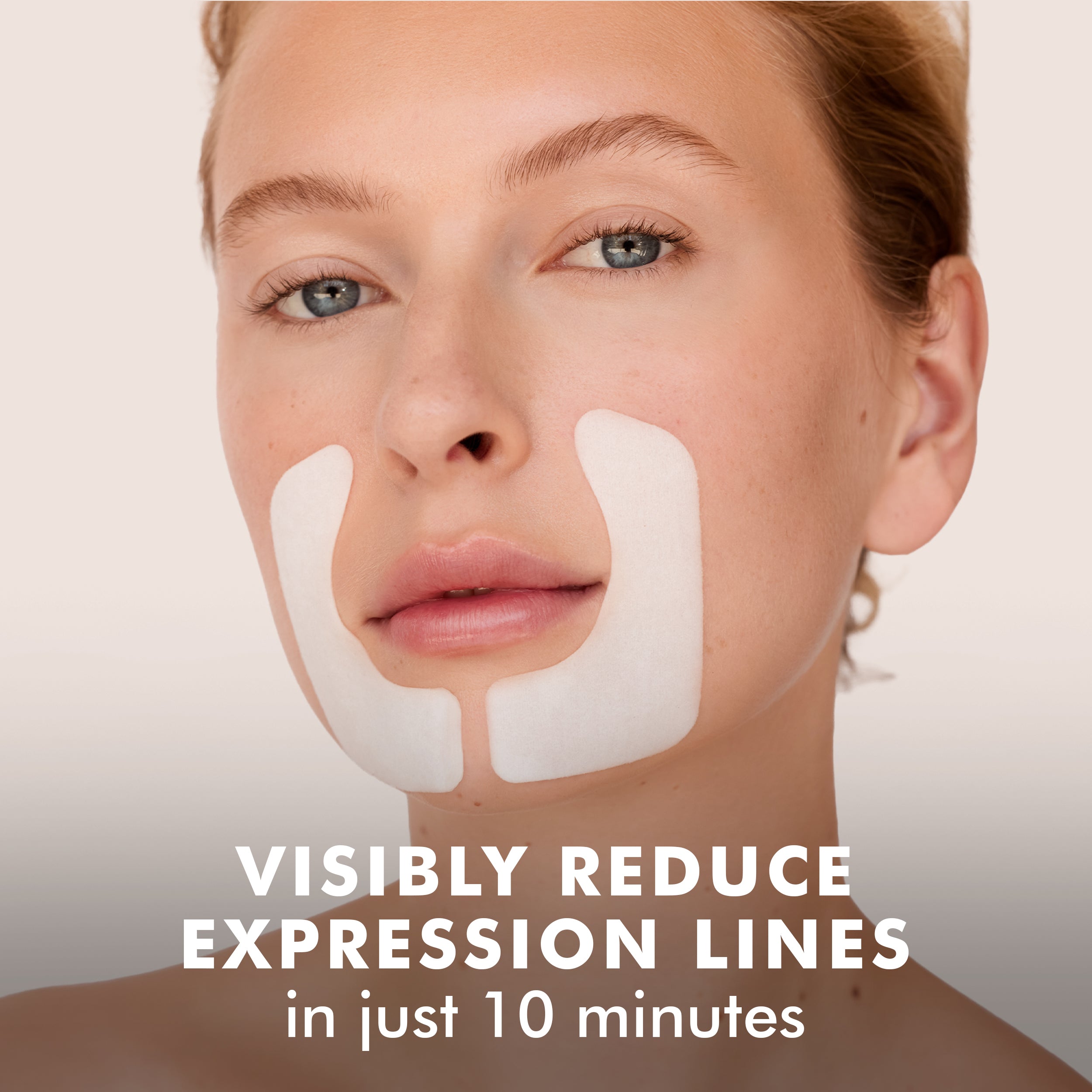 Woman wearing white hydro cool firming face gels along smile lines on cheeks.