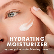 Close-up of woman's cheek with white cream applied, highlighting hydrating moisturizer text.