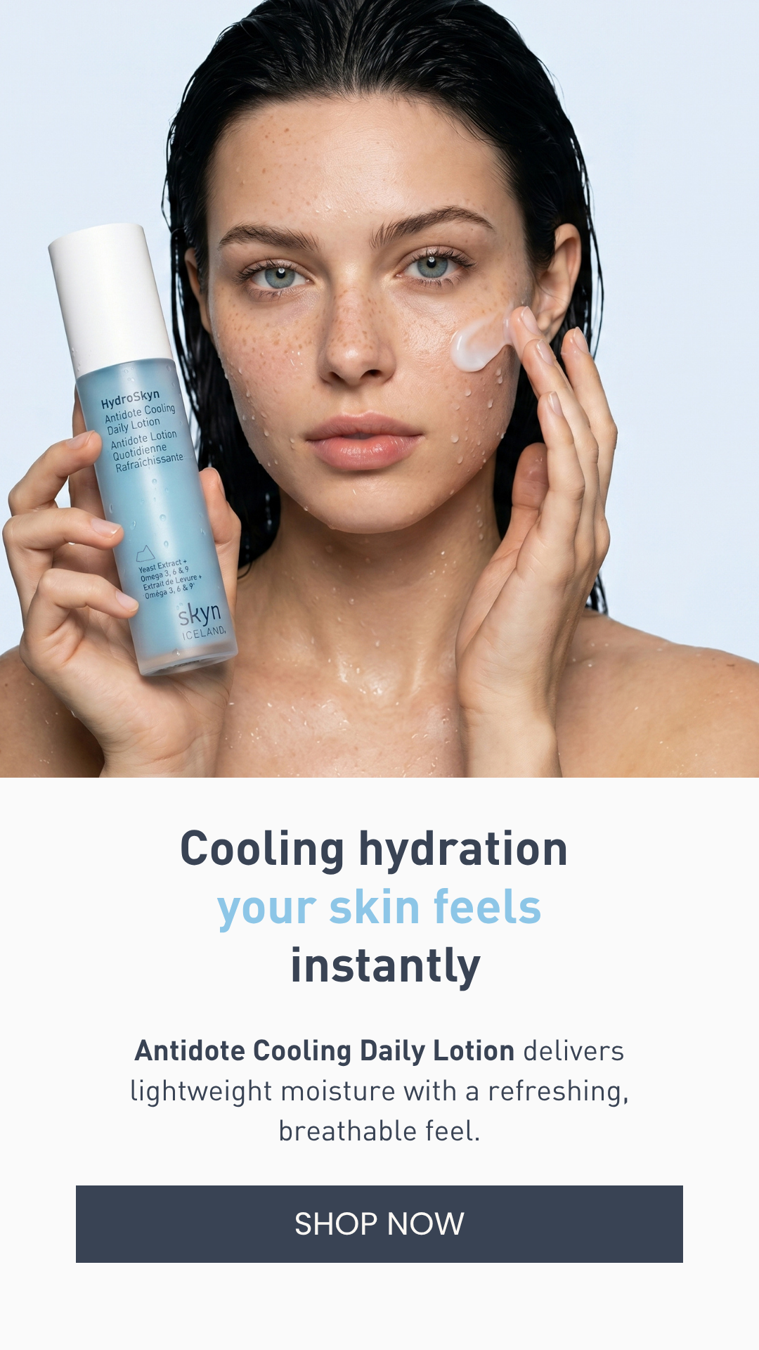 Model holding Antidote Cooling Daily Lotion and applying it to her cheek, with water droplets on skin, promoting lightweight cooling hydration
