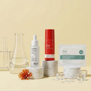 Skyn Glow Boost Bundle with brightening serum, red eye gel, and moisturizing eye patches on marble stands.